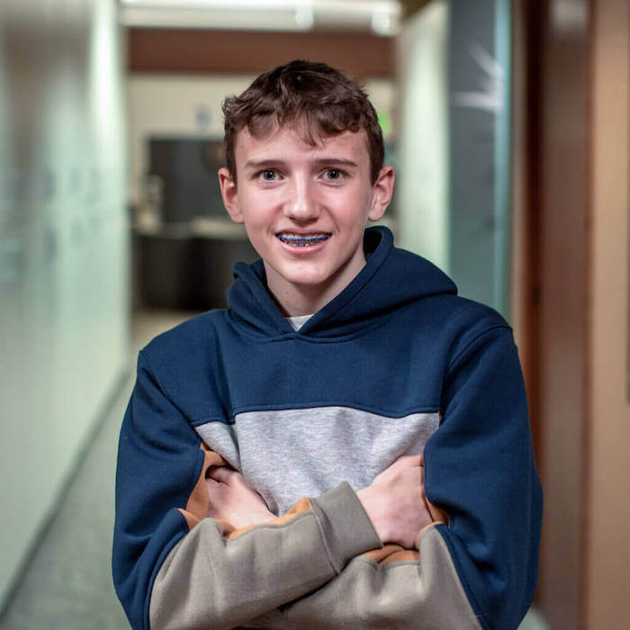 boy with braces smiling