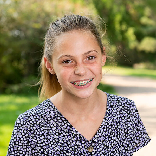 smiling girl with braces