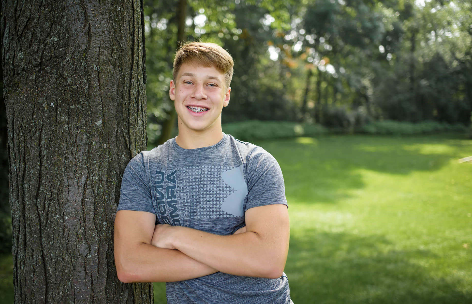 boy with braces smiling